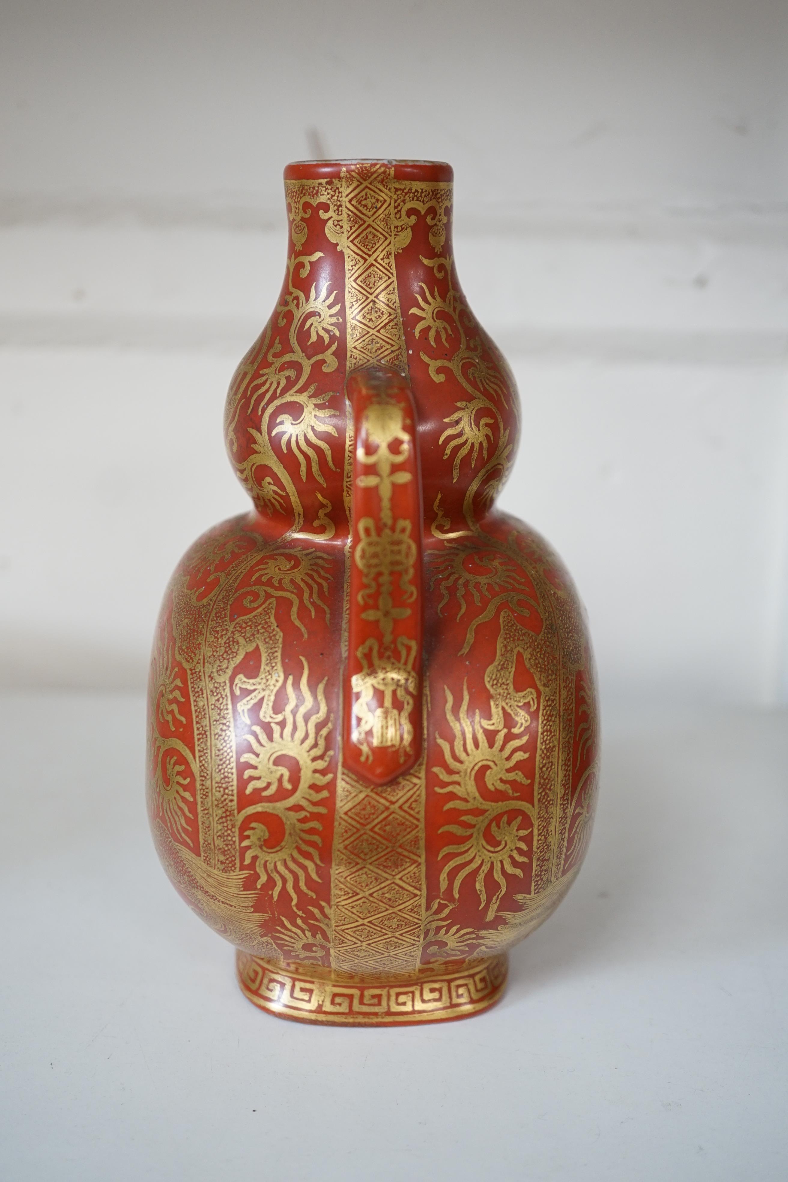 A Chinese gilt decorated coral ground ‘dragon’ vase, 20th century
